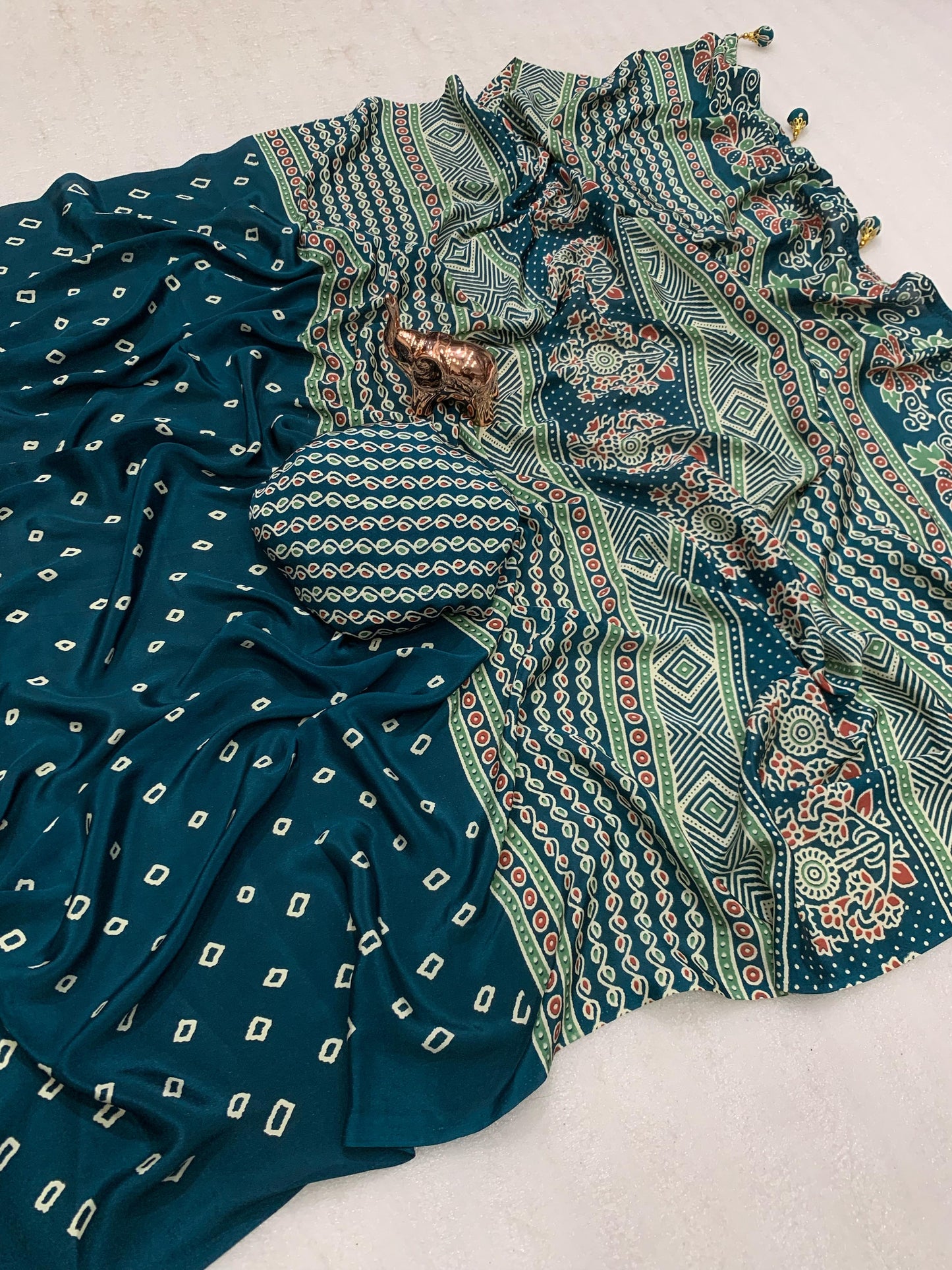 Kayatri New Ajrak printed Rich Pallu With Heavy Tussles Sarees
