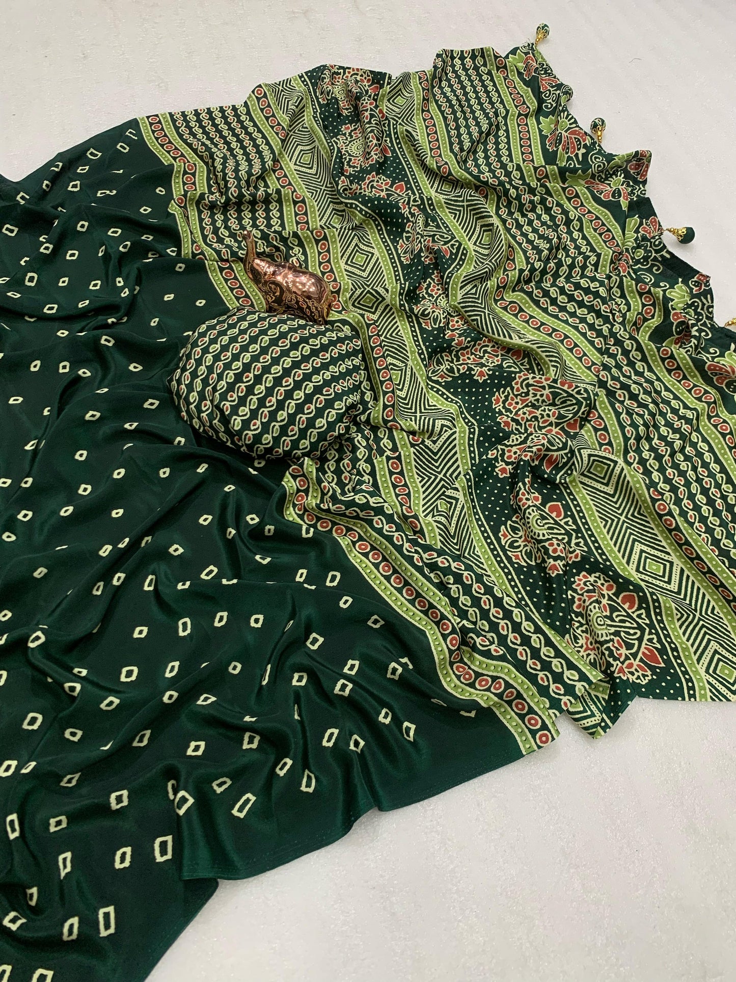 Kayatri New Ajrak printed Rich Pallu With Heavy Tussles Sarees