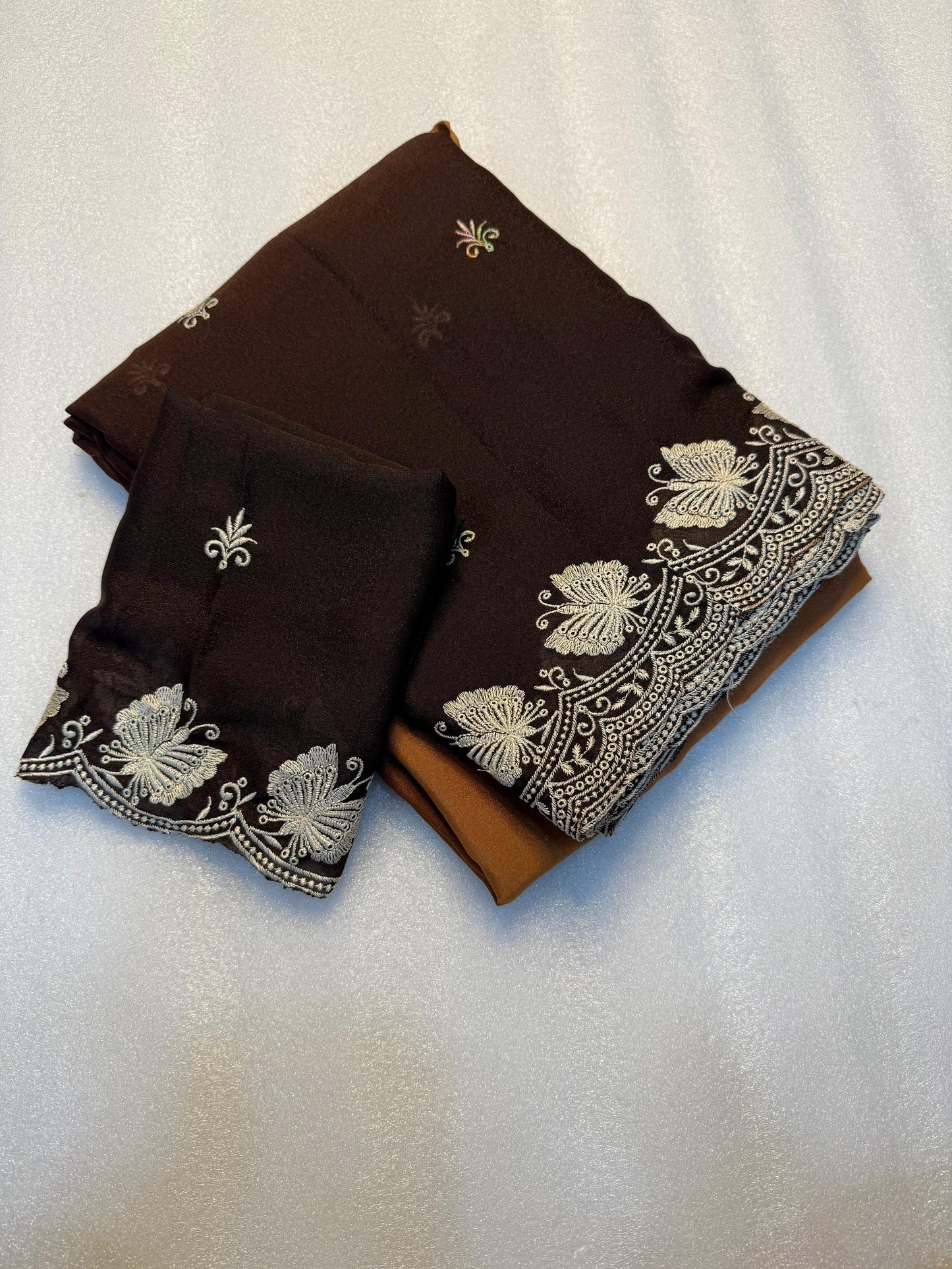 Kayatri New Partywear Soft peddling crunchy saree with beautiful embroidery white thread work design