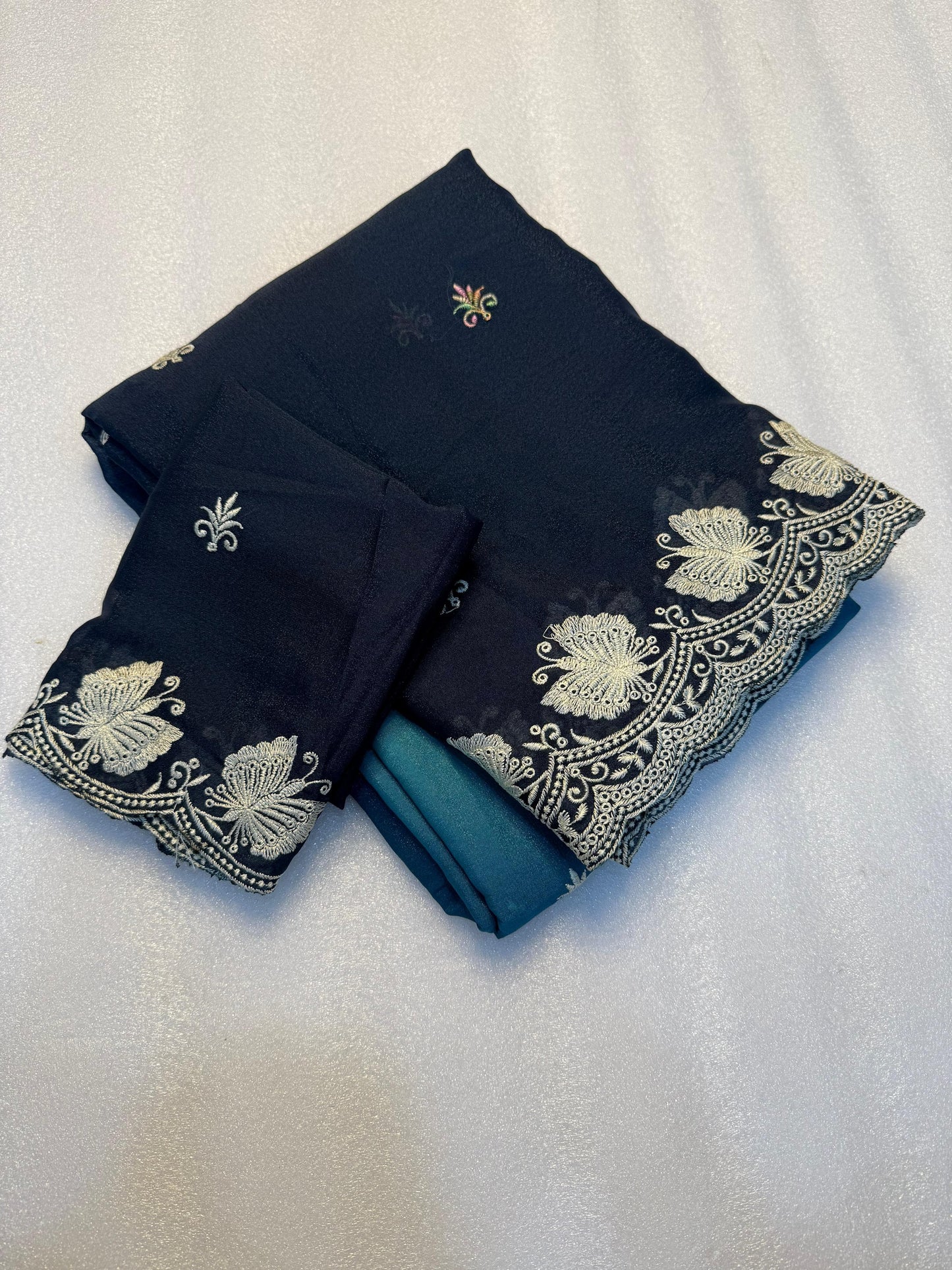Kayatri New Partywear Soft peddling crunchy saree with beautiful embroidery white thread work design