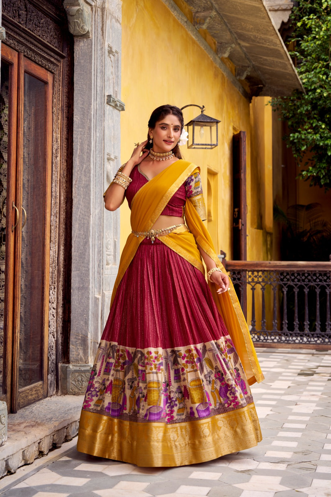 Kyatri New Elegance with this Poly Chanderi lehenga, designed with delicate Zari stripes and enhanced with Kalamkari prints