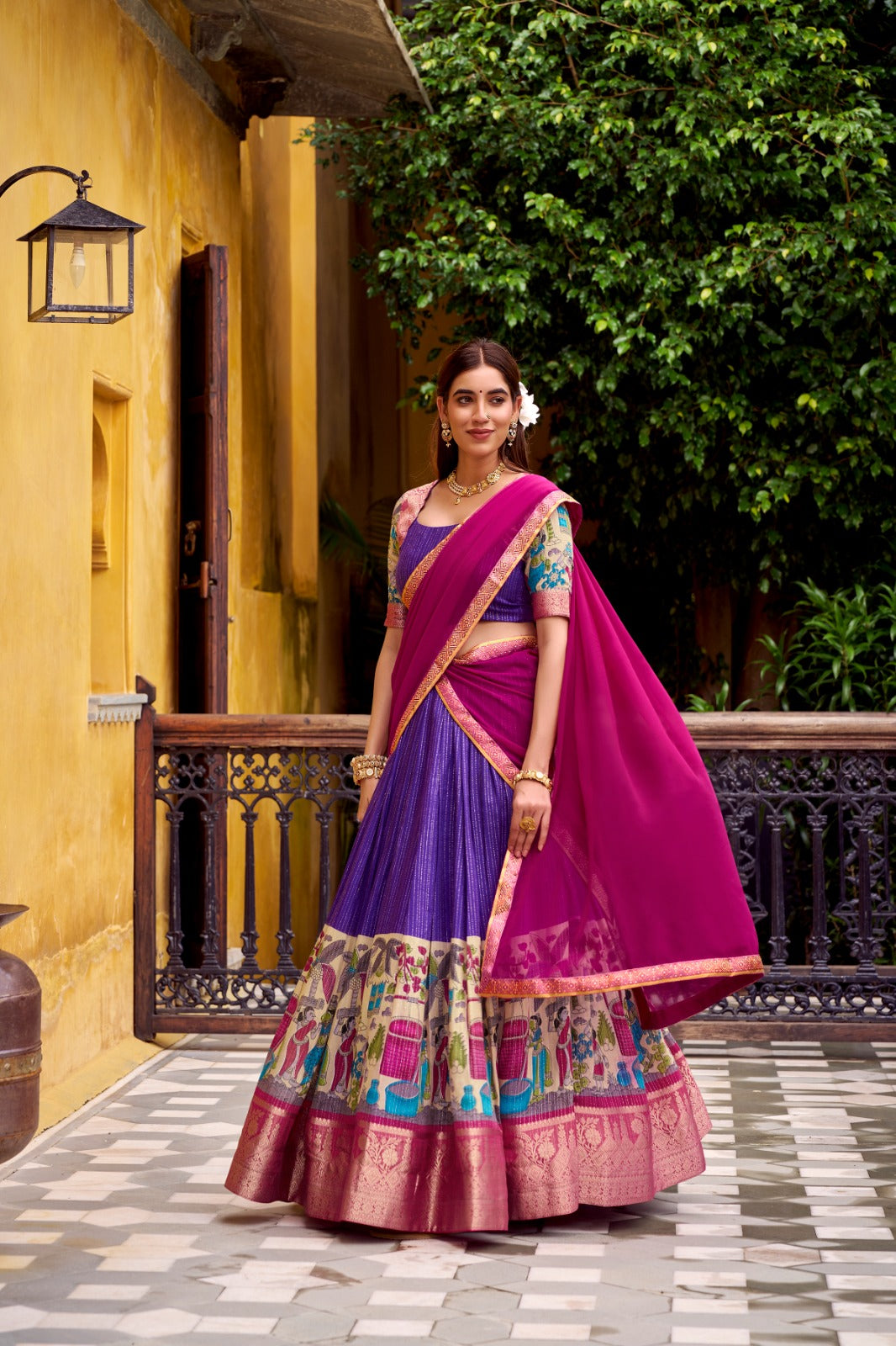 Kyatri New Elegance with this Poly Chanderi lehenga, designed with delicate Zari stripes and enhanced with Kalamkari prints
