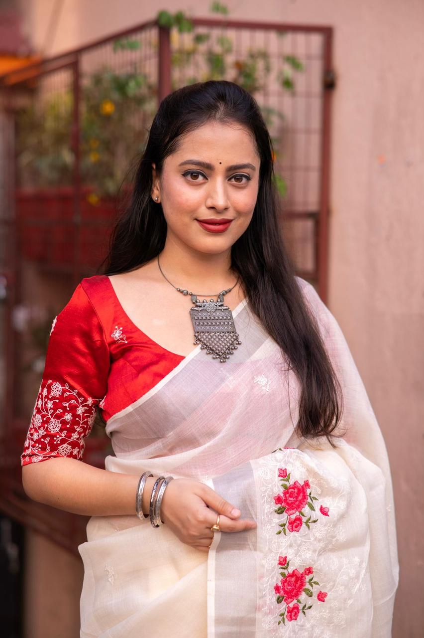 Kayatri Beautifull combination of white thread and multicolor emboridary Saree