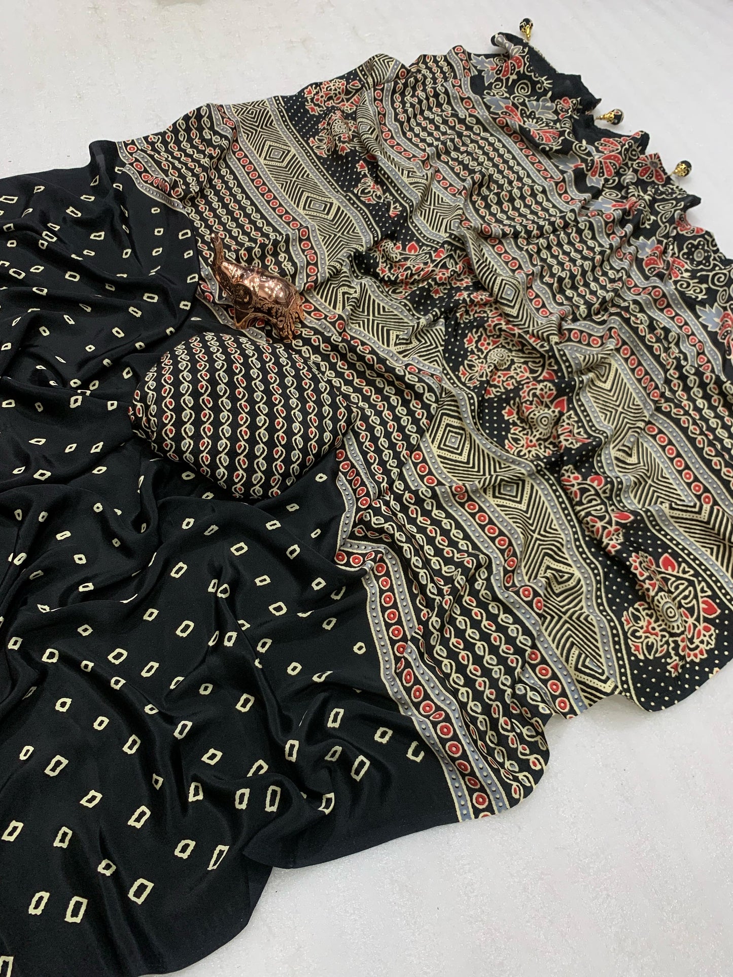 Kayatri New Ajrak printed Rich Pallu With Heavy Tussles Sarees
