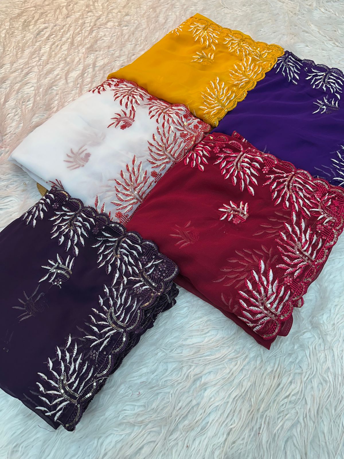 Kayatri New Party wear shinning Georgette with heavy emberoderied with white thread