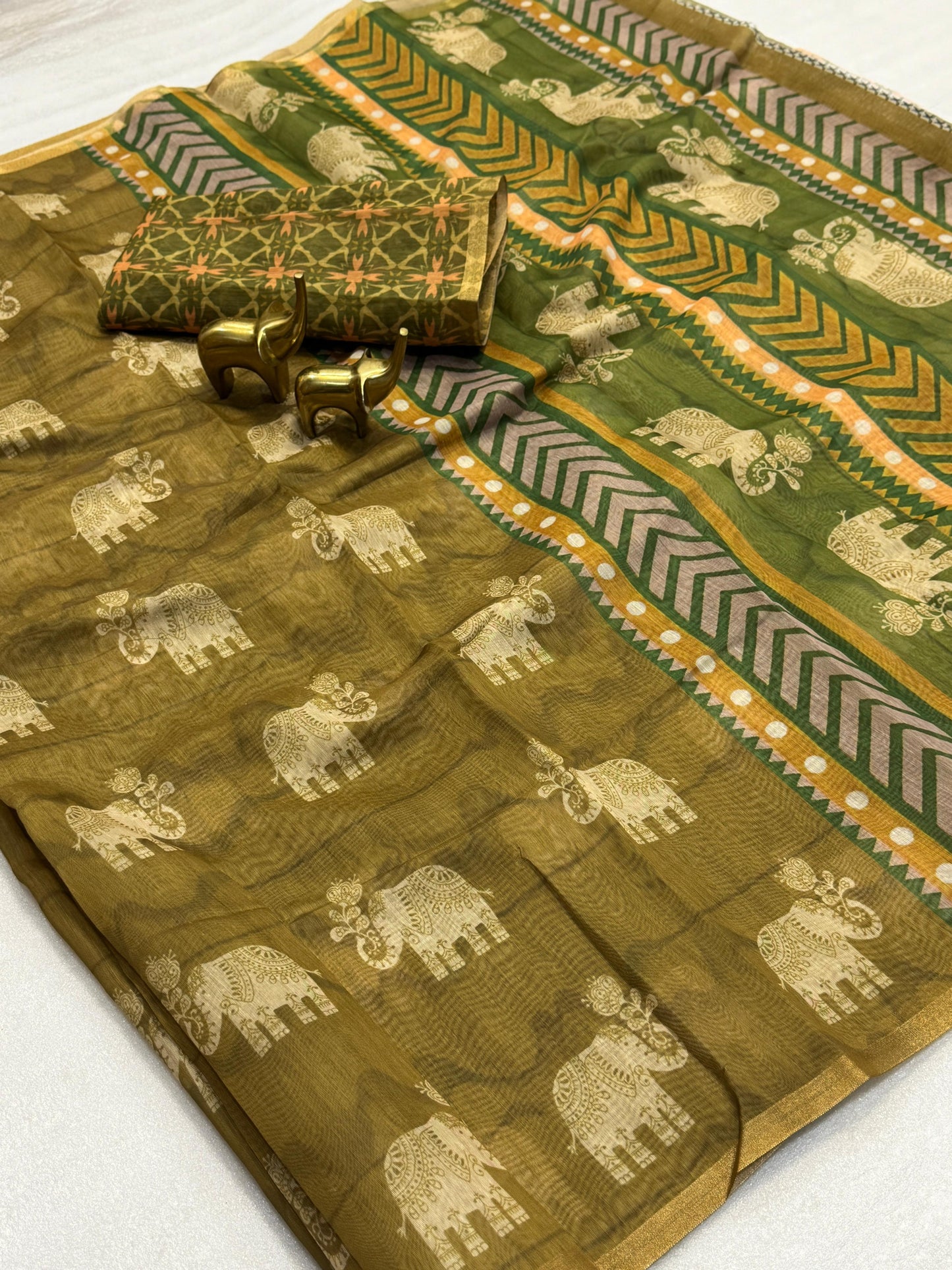 Kayatri New Pure malai cotton saree with zari border and beautiful printed Blouse.