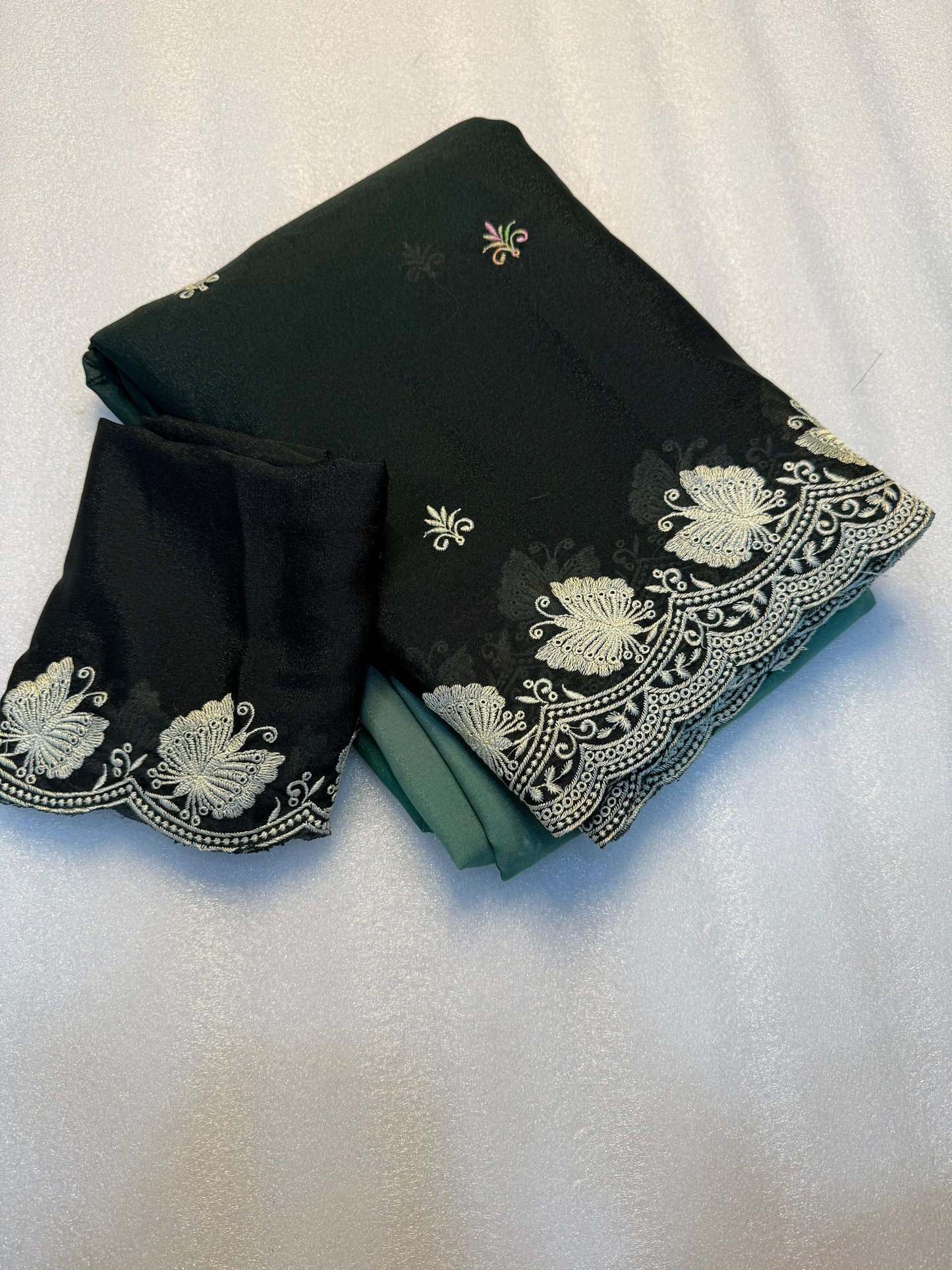 Kayatri New Partywear Soft peddling crunchy  saree with beautiful embroidery white thread work design