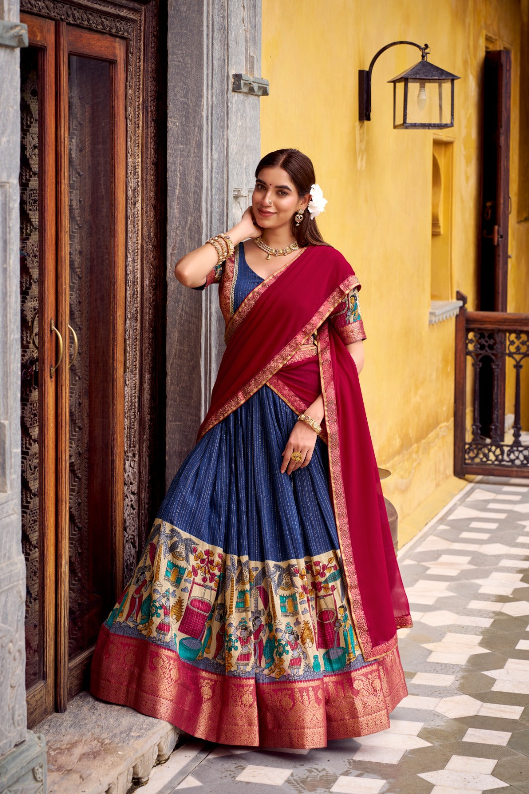 Kyatri New Elegance with this Poly Chanderi lehenga, designed with delicate Zari stripes and enhanced with Kalamkari prints
