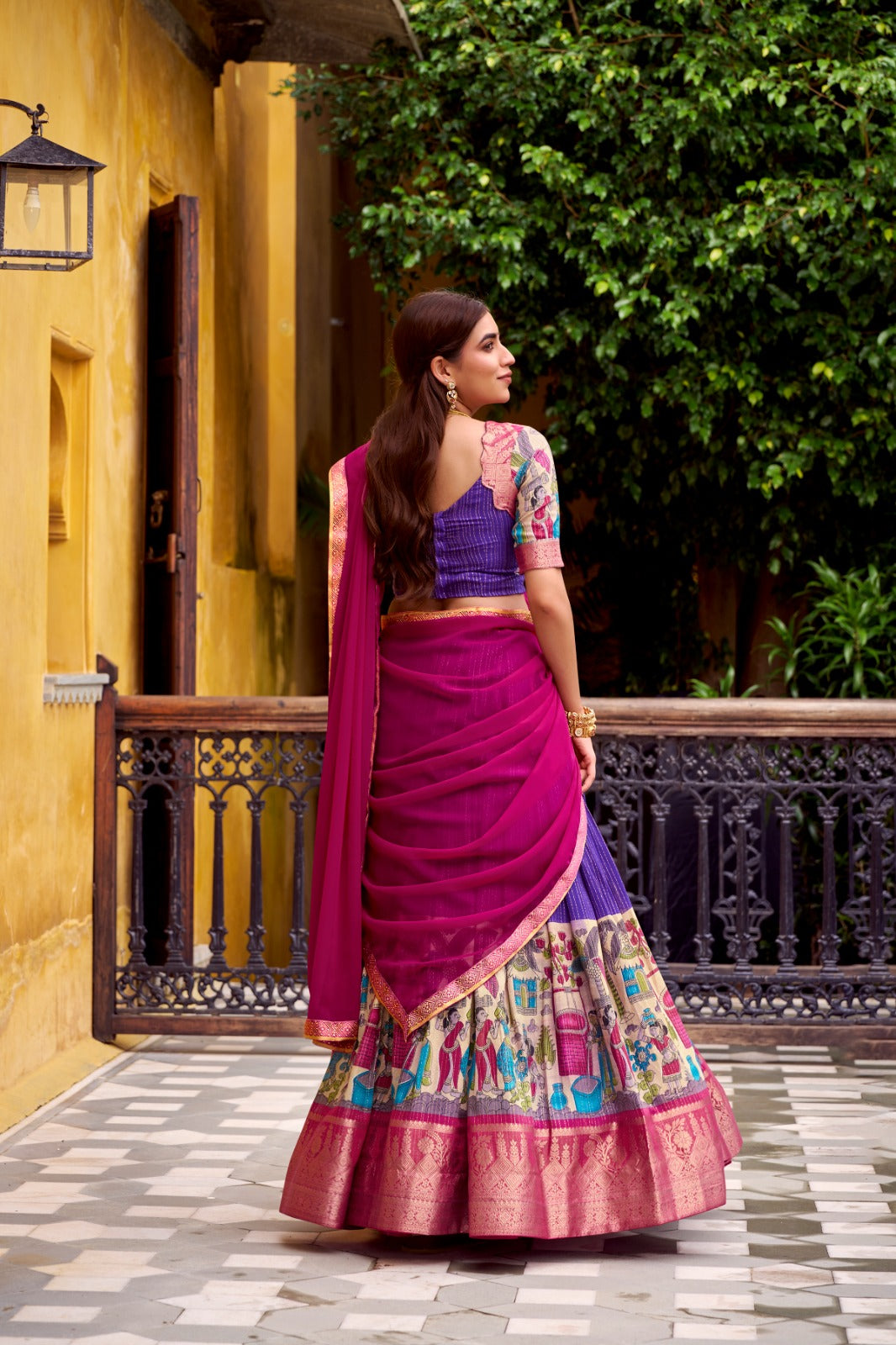 Kyatri New Elegance with this Poly Chanderi lehenga, designed with delicate Zari stripes and enhanced with Kalamkari prints