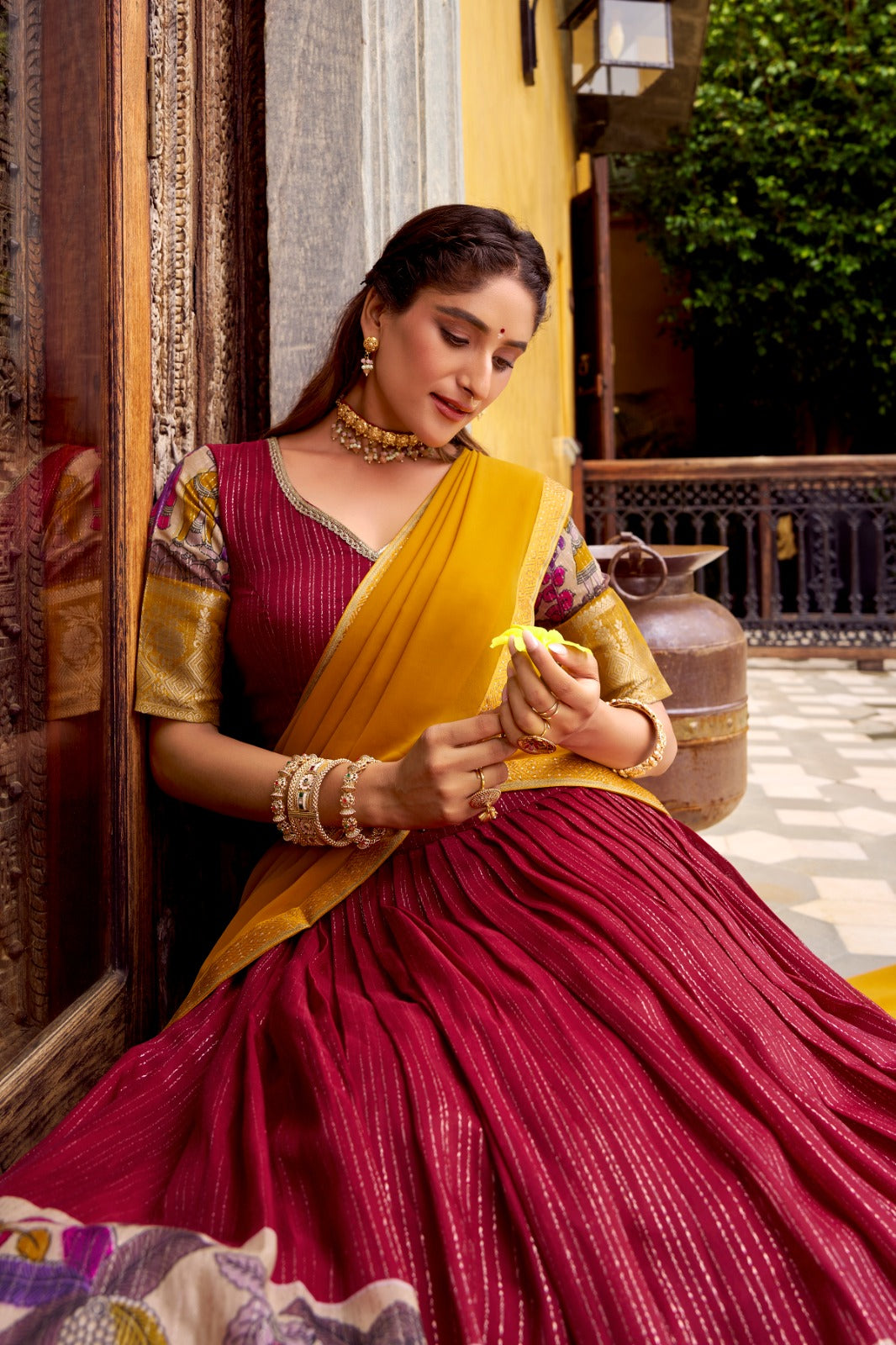 Kyatri New Elegance with this Poly Chanderi lehenga, designed with delicate Zari stripes and enhanced with Kalamkari prints