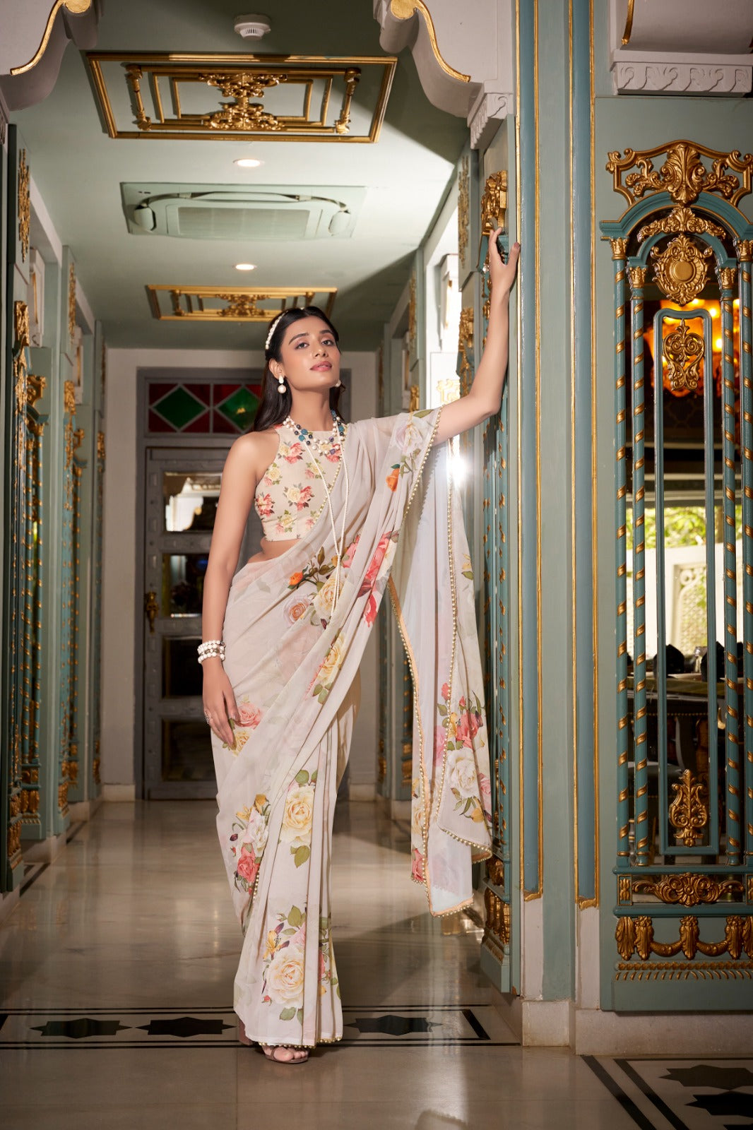 Kayatri New Trendy Georgette Saree with Chic Print and Pearl Lace Embellishment